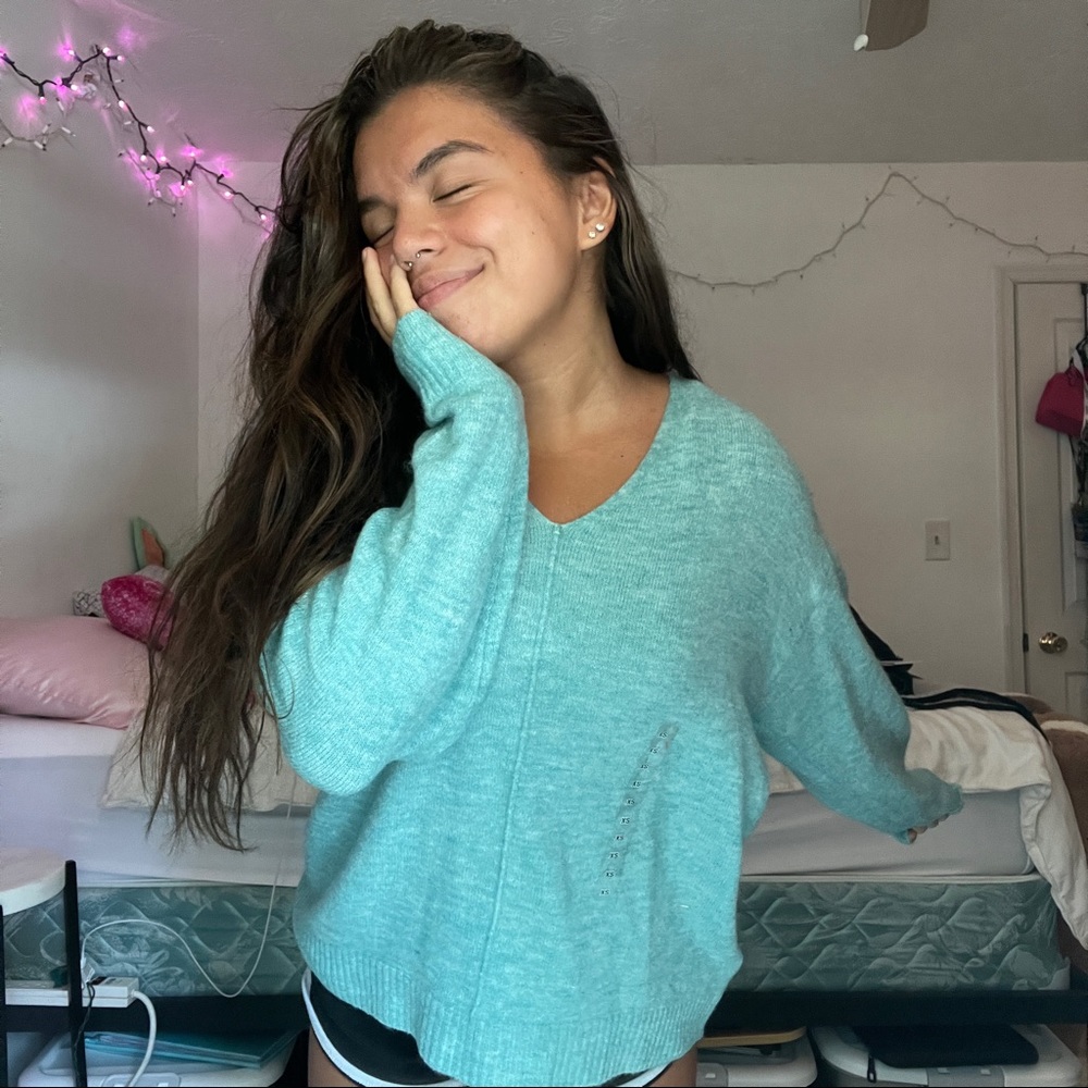 teal sweater